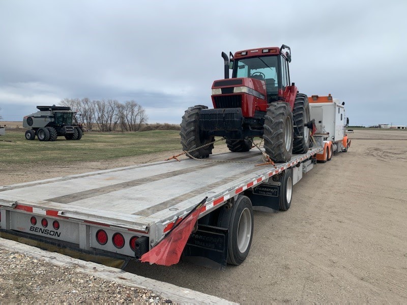 1998 Case IH 8940 Tractor loaded for transport