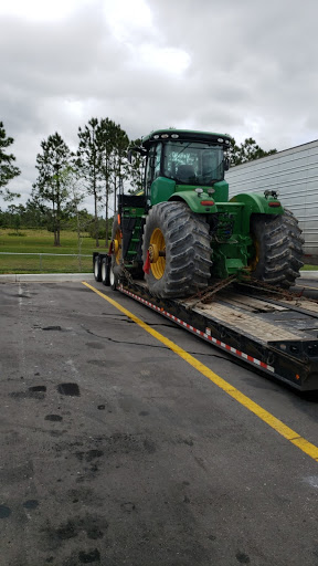 John Deere 9560 Tractor shipped on a lowboy trailer