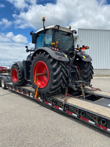 Fendt 939 Profi-Plus Tractor loaded for transport on a lowboy trailer