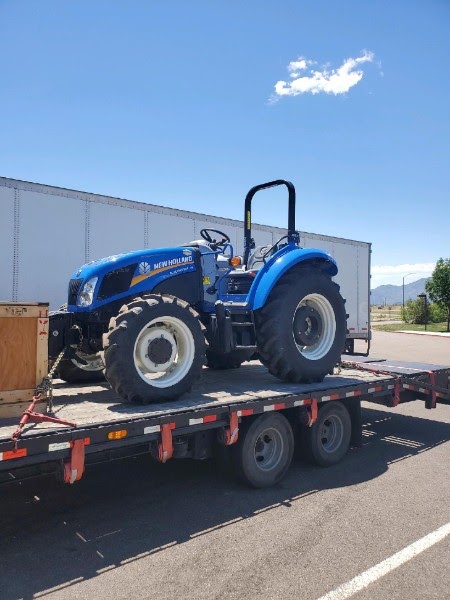 New Holland Powerstar 75 Tractor loaded for transport