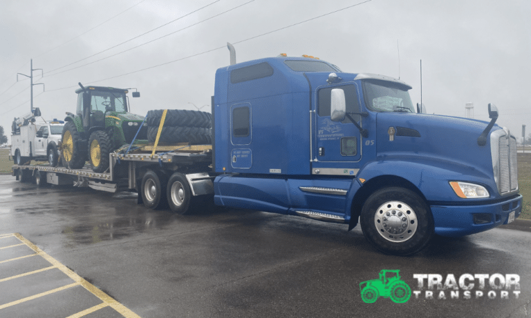 shipping John Deere 7830 Tractor loaded with a utility truck on a step deck trailer