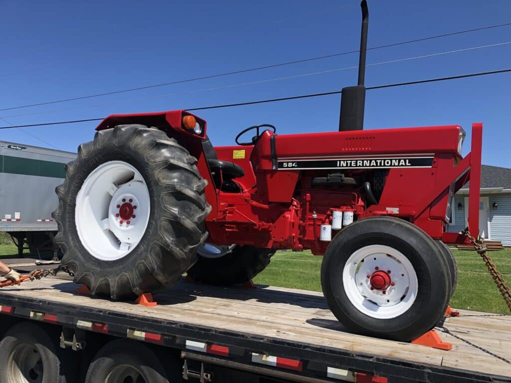 1989 International Harvester Tractor loaded for transport