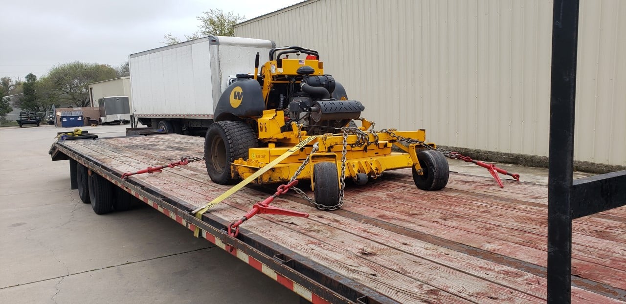 Wright Stander Mower loaded for transport