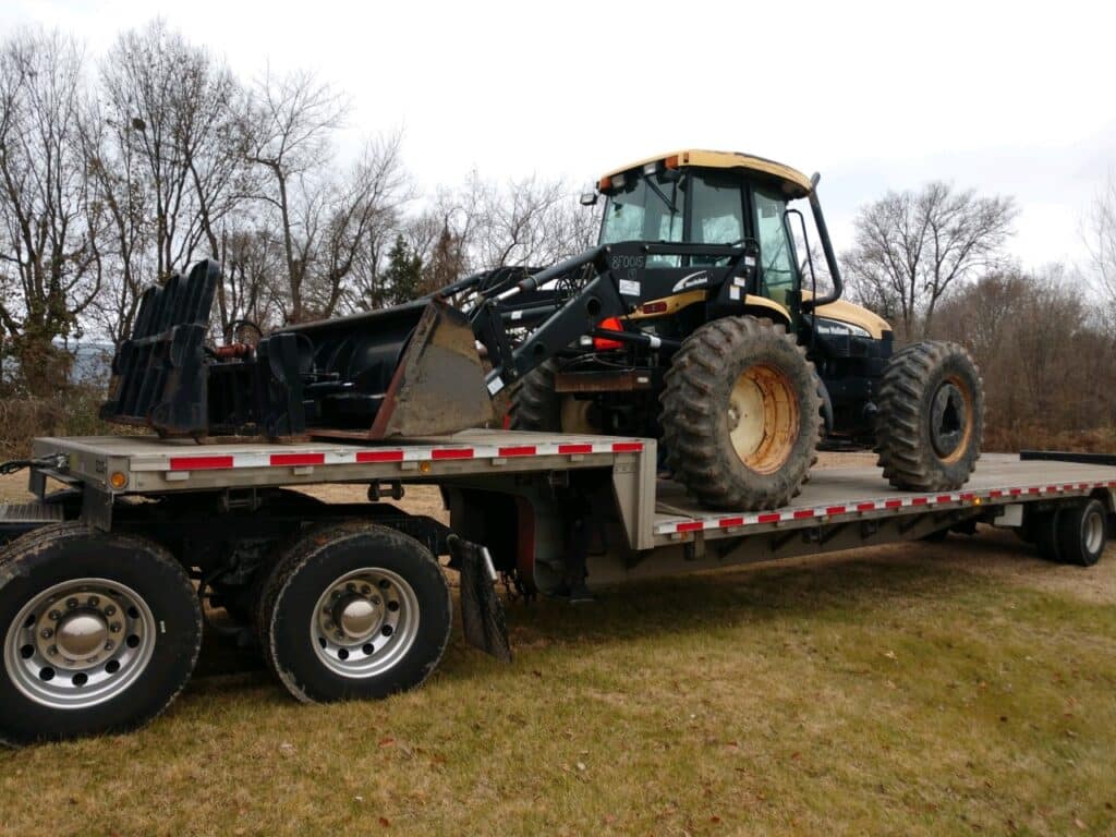 New Holland Tractor loaded for transport