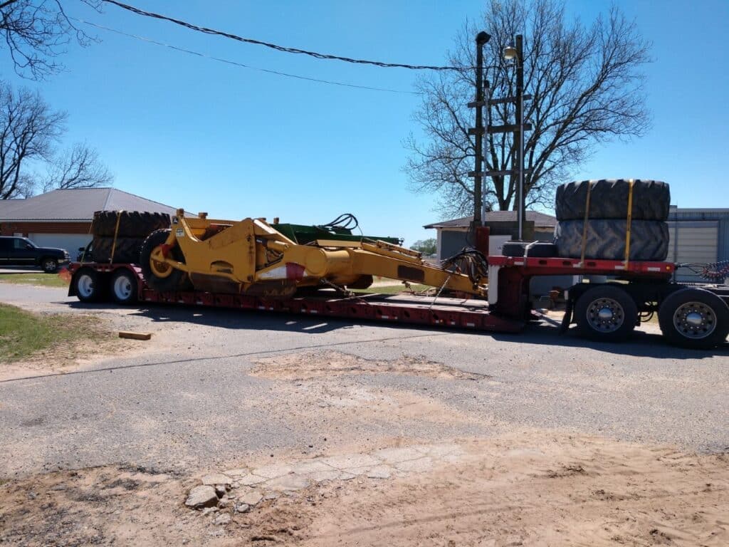 Construction equipment loaded for transport