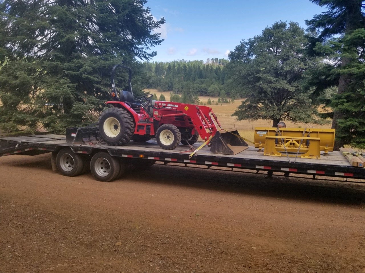 Branson BL25R Tractor loaded for transport