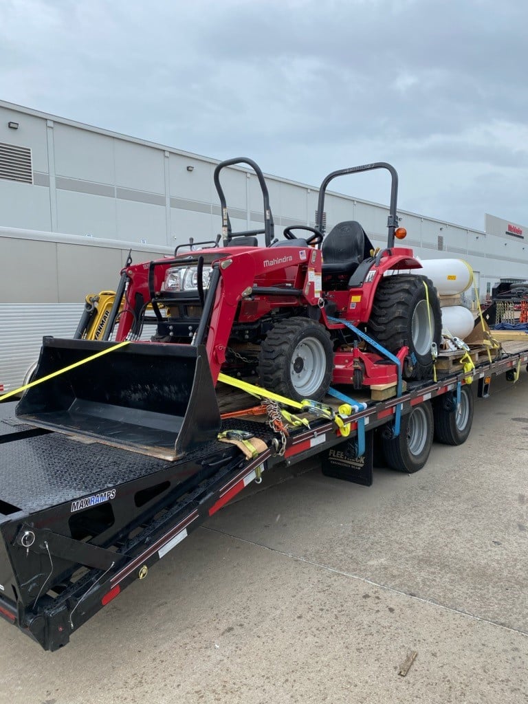 Mahindra 1526 Tractor loaded for transport