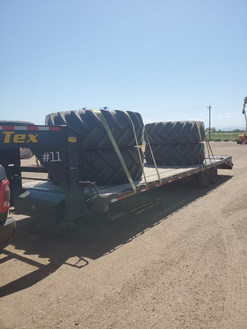 Transporting tractor tires on a hot shot trailer