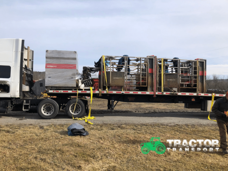 Milking system loaded for transport on a flatbed trailer