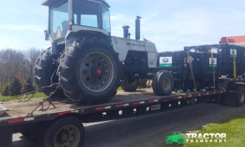Hauling a White Tractor