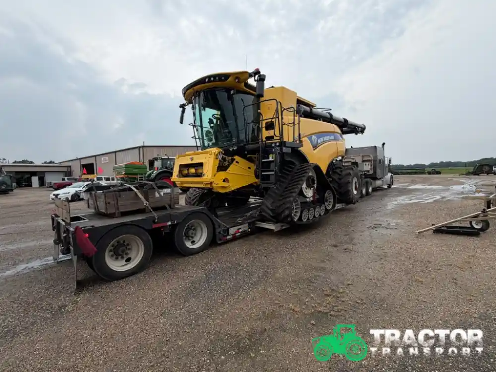 New Holland CR combine loaded for farm equipment transport in Indiana