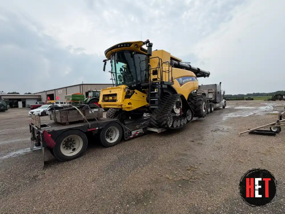 New Holland CR combine loaded for farm equipment transport in Compton, CA