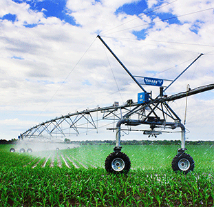 Tractor Transport hauls irrigation equipment
