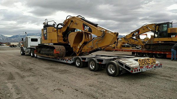Tractor being Transported, heavy hauling tractor, tractor transport quotes
