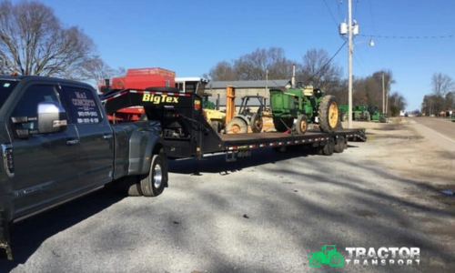 Step-deck trailer configured for vintage tractor transport