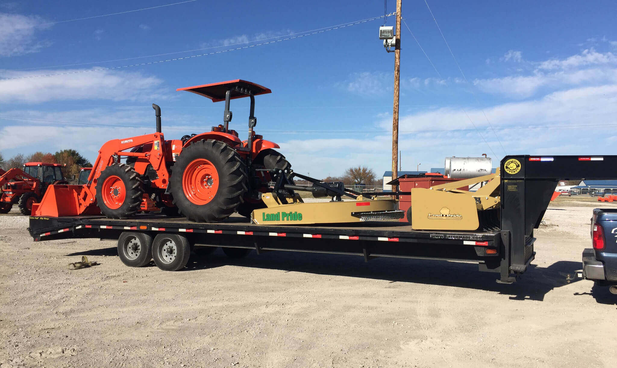 Transporting Kubota L3000DT Loader with Land Pride Attachments