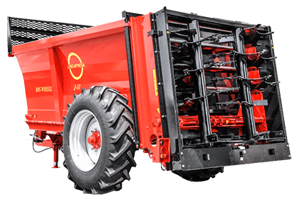 Tractor Transport hauls farm manure spreaders