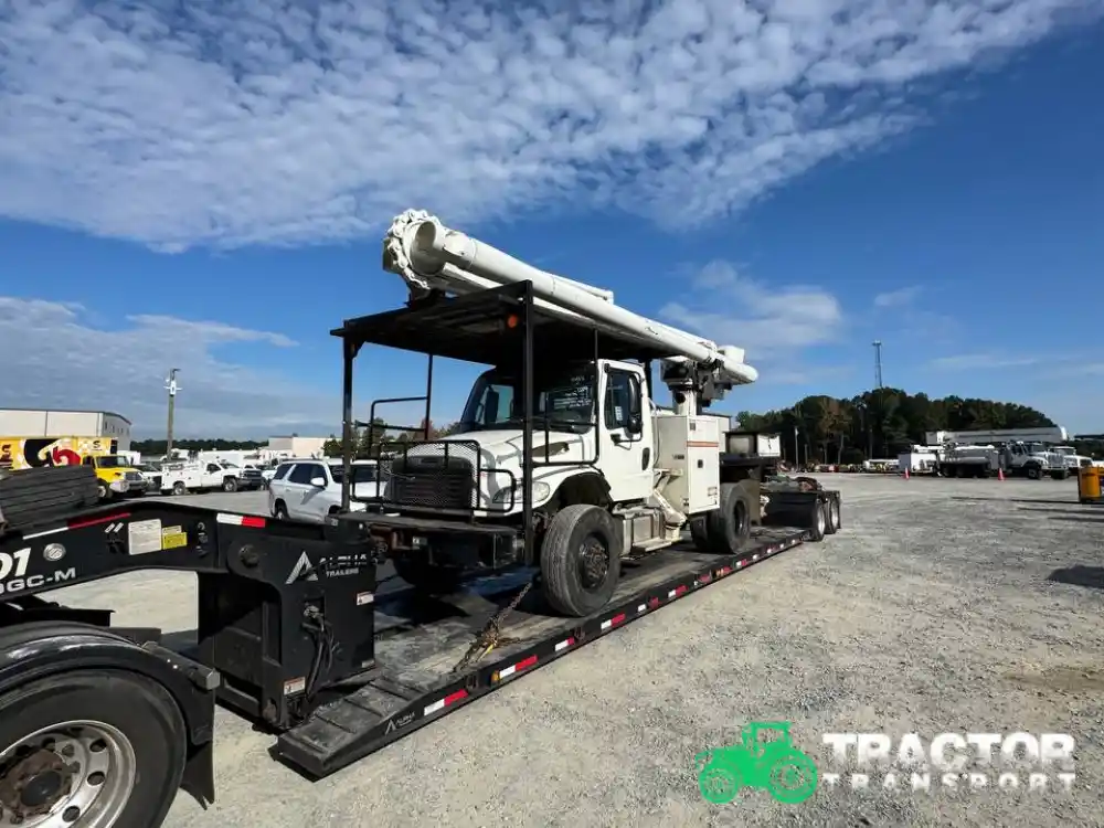 Transporting an Freightliner M2 106 Bucket Boom Truck