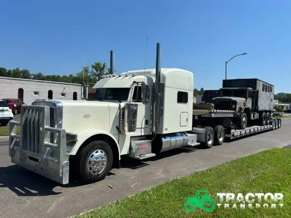 Transporting an M923 military vehicle